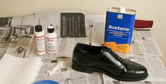 using acetone to remove paint on leather shoes